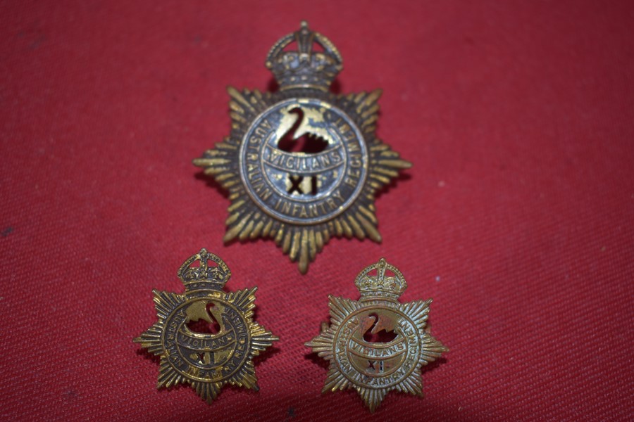 AUSTRALIAN ARMY HAT AND COLLAR BADGE SET 11 BN 30-42 VOIDED.-SOLD